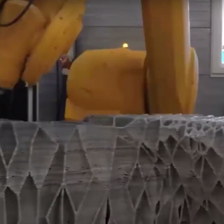 Robotically 3D printed chaise longue changes into recliner